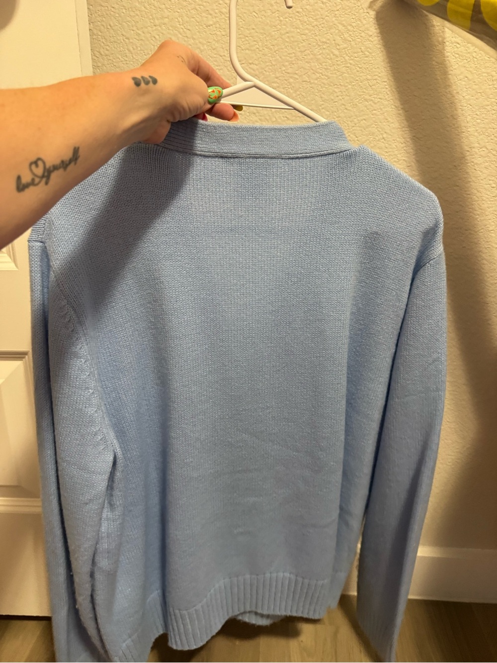 Light Blue Cardigan Sweater with Colorful Nutcracker Sequin Design - Picture 6 of 9
